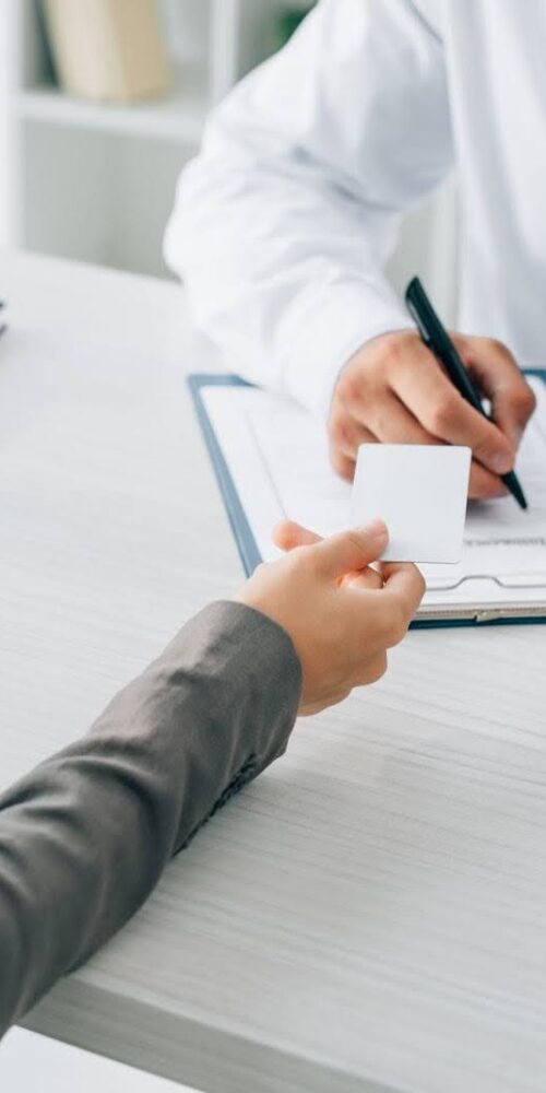 Psychiatrist filling out medication order for patient. | Indiana Advanced Psychiatry